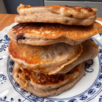 A stack of pancakes baked at Dominique's Kitchen